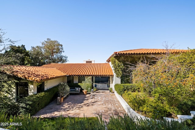 view of front of house featuring a patio