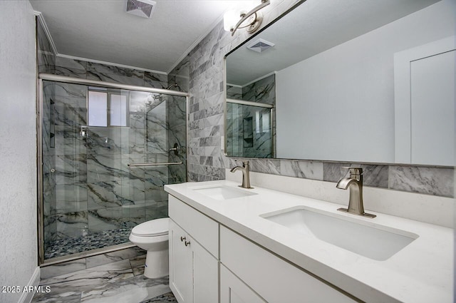 4202 W Purdue Ave, Phoenix, AZ 85051 - full bathroom with marble look tile flooring, toilet, a marble finish shower, double vanity, and ornamental molding