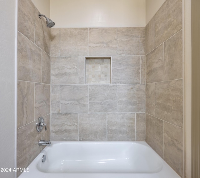 bathroom with shower / tub combination