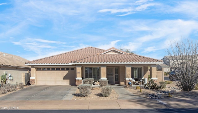 view of front of home with a garage