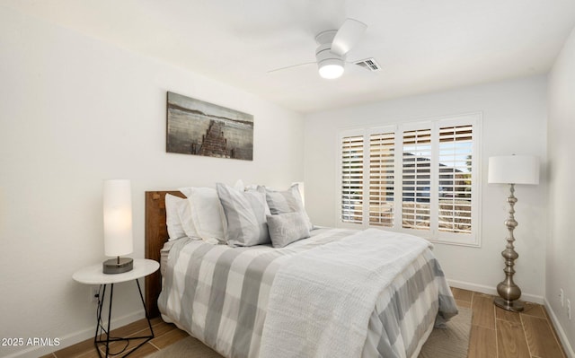 bedroom featuring light hardwood / wood-style flooring and ceiling fan