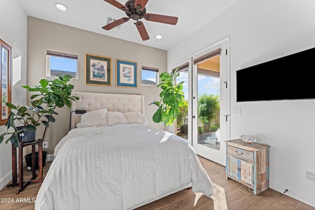 bedroom featuring ceiling fan, access to exterior, and light wood-type flooring