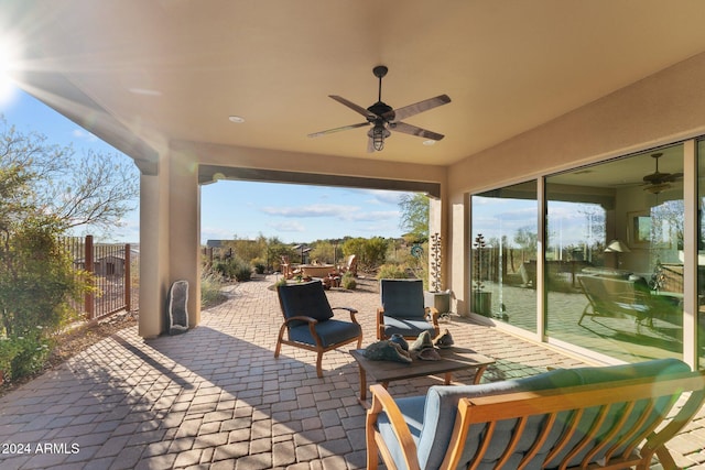 view of patio featuring outdoor lounge area and ceiling fan