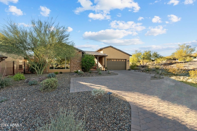 view of front of home with a garage