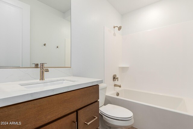 full bathroom with shower / tub combination, toilet, and vanity