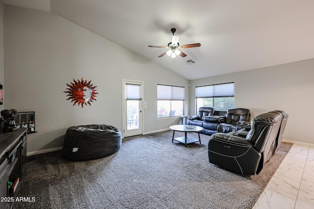 living room with ceiling fan and lofted ceiling