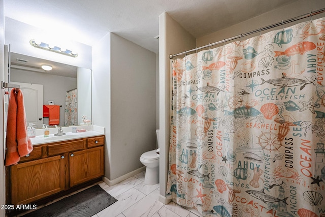 bathroom with a shower with curtain, vanity, and toilet