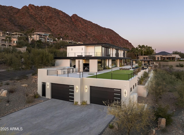 view of front of property with a mountain view