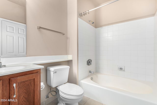 full bathroom featuring toilet, tile patterned floors, vanity, and shower / bathing tub combination