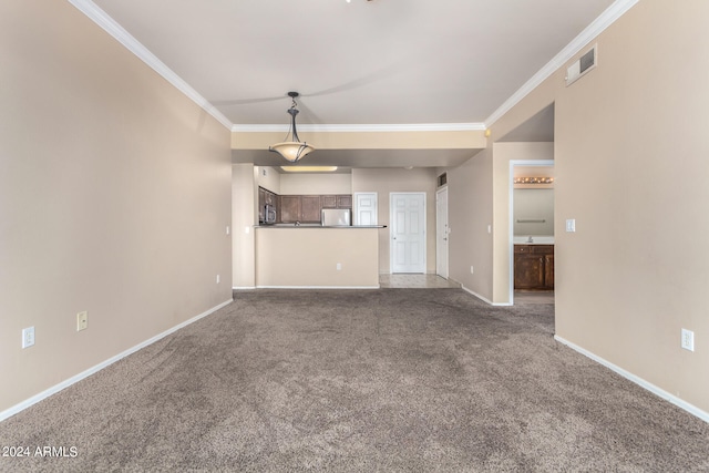 unfurnished living room featuring dark colored carpet and crown molding