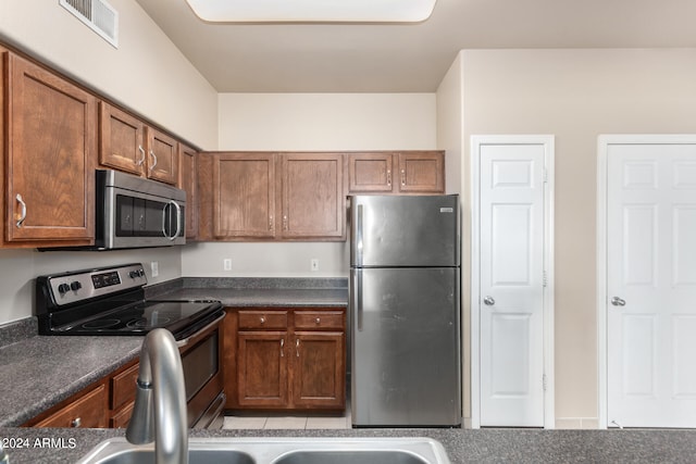 kitchen with stainless steel appliances and sink