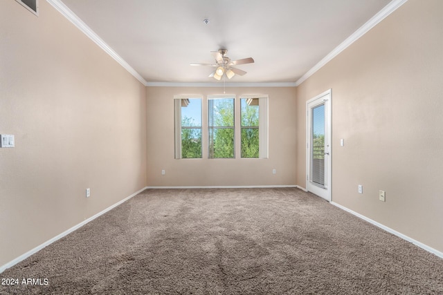 unfurnished room with ceiling fan, carpet, and crown molding