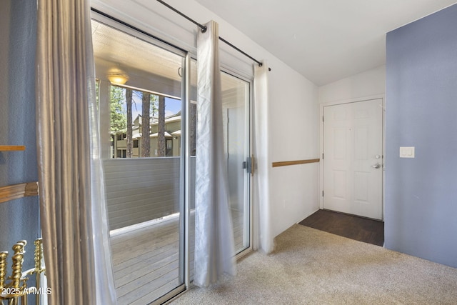 1185 W University Ave Unit 213, Flagstaff, AZ 86001 - doorway to outside featuring carpet flooring