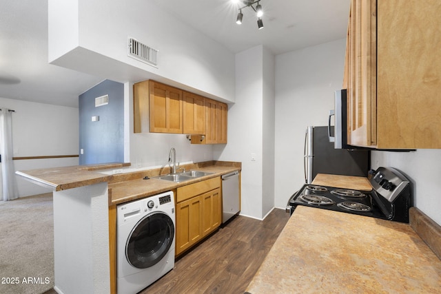1185 W University Ave Unit 213, Flagstaff, AZ 86001 - kitchen featuring washer / clothes dryer, appliances with stainless steel finishes, dark wood-style floors, and light countertops