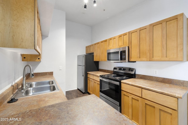 1185 W University Ave Unit 213, Flagstaff, AZ 86001 - kitchen featuring stainless steel appliances, dark wood finished floors, and light countertops