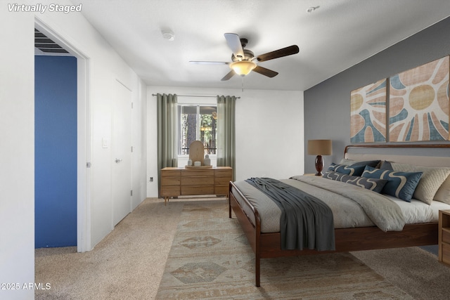 1185 W University Ave Unit 213, Flagstaff, AZ 86001 - carpeted bedroom with a ceiling fan