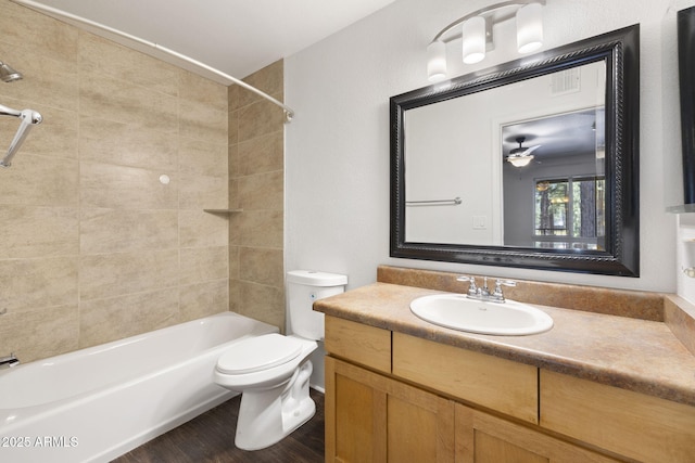 1185 W University Ave Unit 213, Flagstaff, AZ 86001 - bathroom featuring vanity, washtub / shower combination, ceiling fan, and wood finished floors