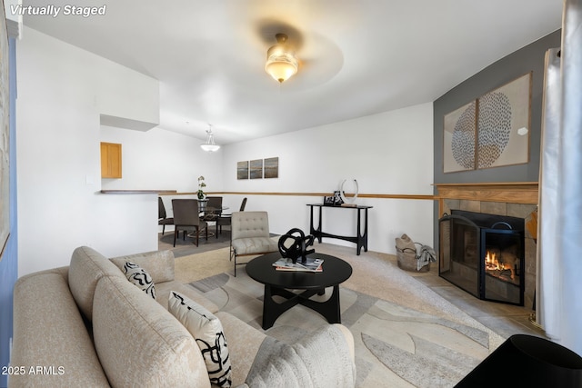 1185 W University Ave Unit 213, Flagstaff, AZ 86001 - carpeted living area with a tile fireplace