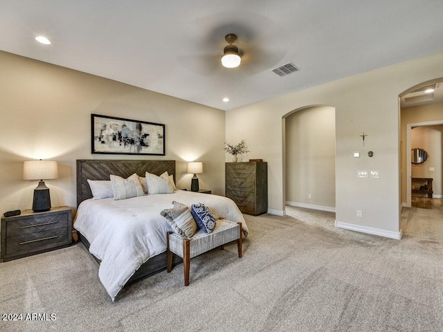 carpeted bedroom with ceiling fan