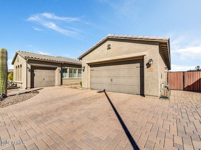 view of front of property with a garage