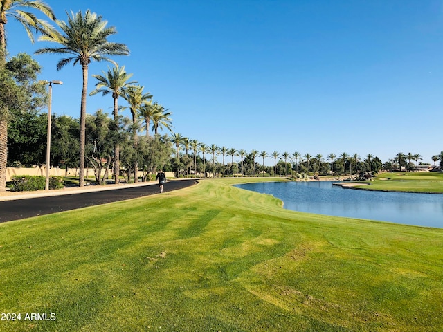 property view of water featuring view of golf course