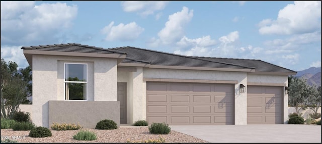 46887 W Old Timer Rd, Maricopa, AZ 85139 - prairie-style house featuring stucco siding, a garage, driveway, and a tile roof