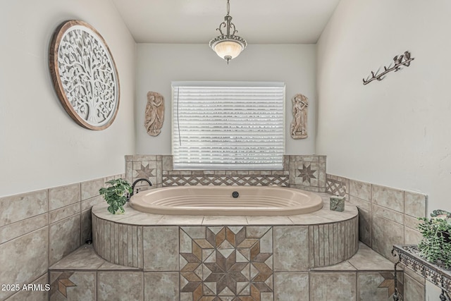 full bath with a garden tub