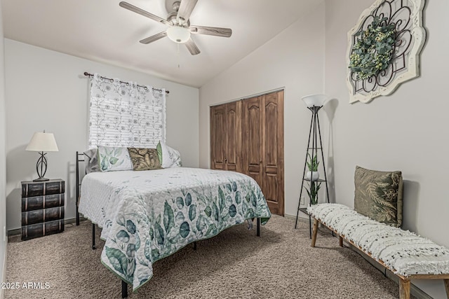bedroom featuring a ceiling fan, vaulted ceiling, carpet, and a closet