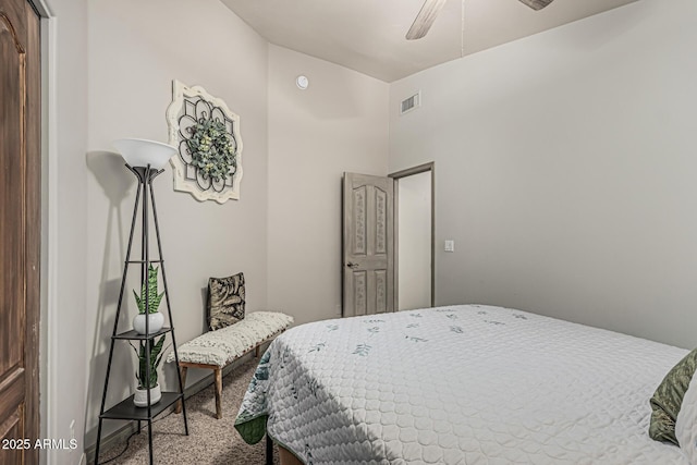 bedroom featuring vaulted ceiling, carpet floors, a ceiling fan, and visible vents