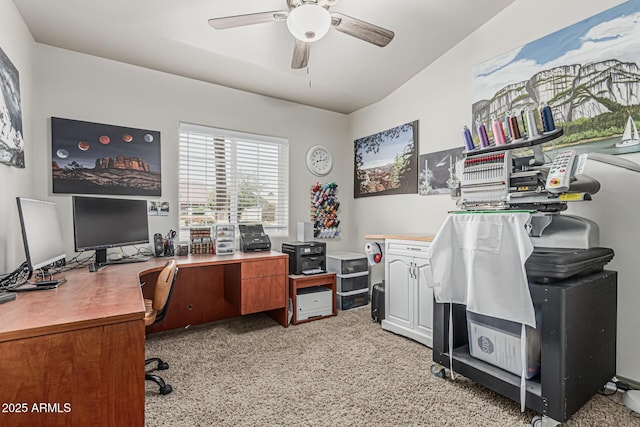 office featuring ceiling fan and light carpet