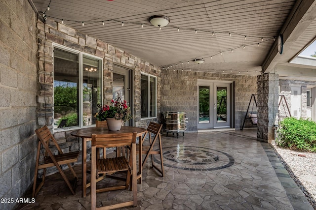 view of patio / terrace featuring french doors and outdoor dining area