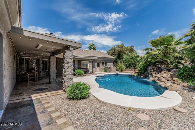 outdoor pool with a patio