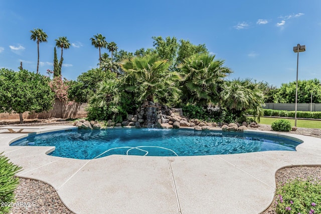 view of pool with fence and a fenced in pool