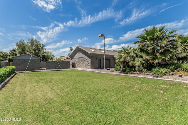 view of yard with fence