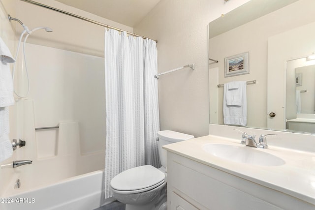 full bath featuring toilet, shower / bath combo, and vanity