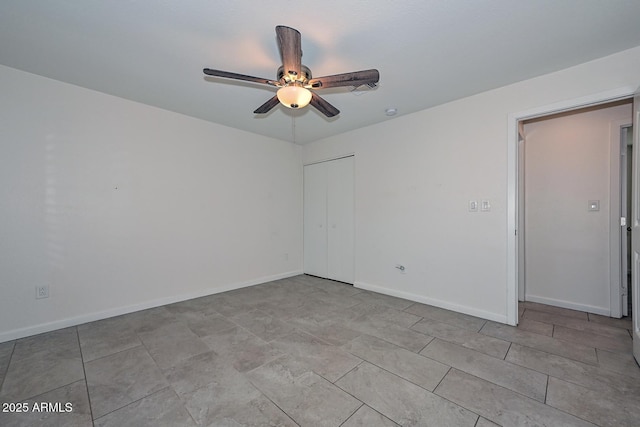 empty room featuring ceiling fan