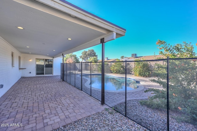 view of pool featuring a patio area