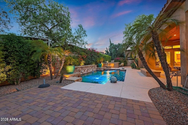 outdoor pool featuring a patio area