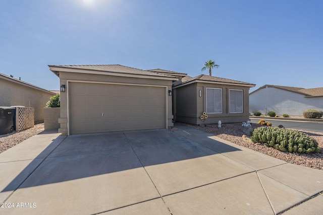 view of front of home featuring a mountain view and a garage