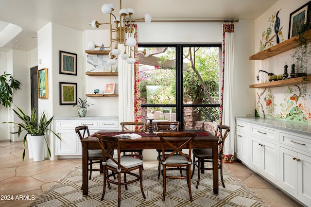 dining space featuring plenty of natural light and a chandelier