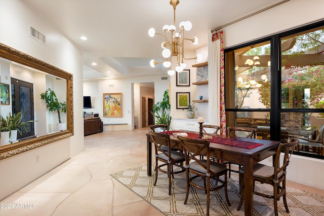 dining room featuring a chandelier