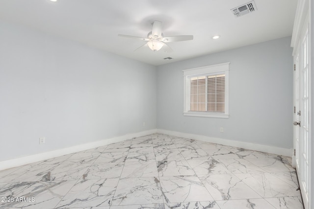 3316 E Fillmore St, Phoenix, AZ 85008 - spare room featuring ceiling fan, recessed lighting, and marble finish flooring
