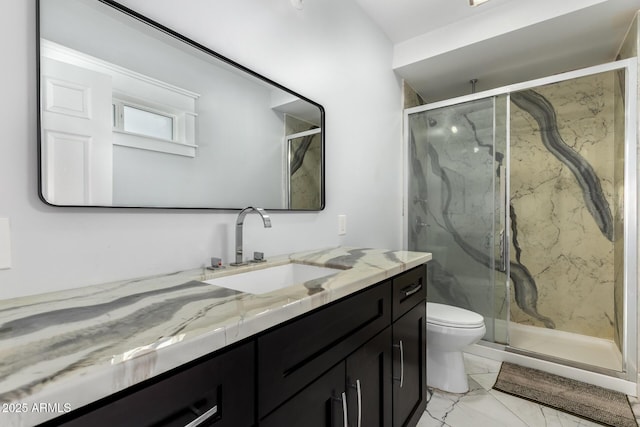 3316 E Fillmore St, Phoenix, AZ 85008 - full bathroom featuring vanity, a marble finish shower, and marble look tiles