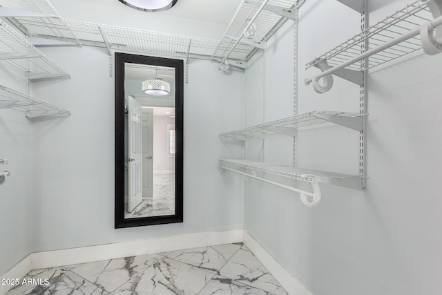 3316 E Fillmore St, Phoenix, AZ 85008 - walk in closet with marble look tile flooring