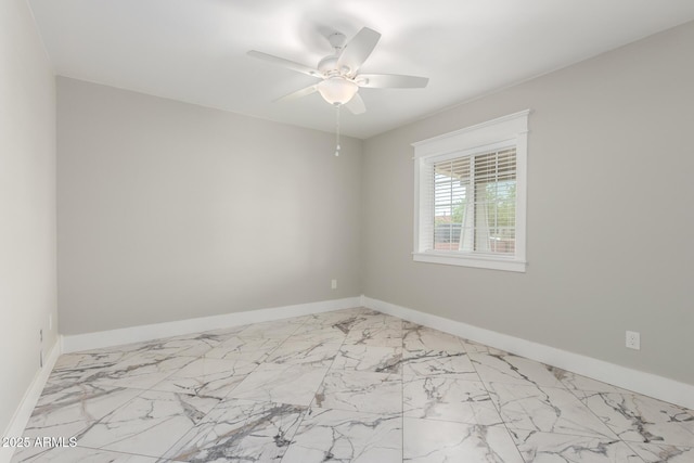 3316 E Fillmore St, Phoenix, AZ 85008 - unfurnished room featuring a ceiling fan and light marble finish floors