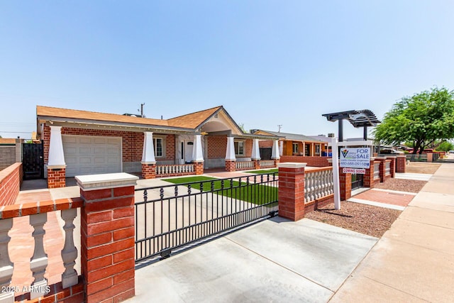 3316 E Fillmore St, Phoenix, AZ 85008 - view of front of property featuring a fenced front yard, an attached garage, brick siding, and covered porch