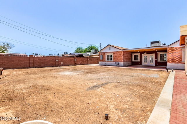 3316 E Fillmore St, Phoenix, AZ 85008 - fenced yard with french doors and a patio area