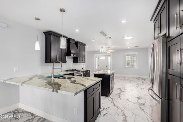 3316 E Fillmore St, Phoenix, AZ 85008 - kitchen featuring custom range hood, light marble finish flooring, a center island, recessed lighting, and a peninsula