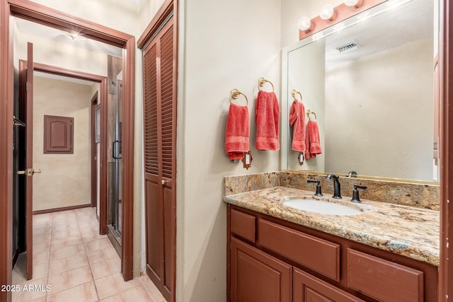 bathroom featuring vanity and visible vents