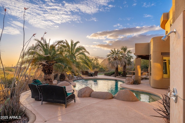 pool featuring a patio